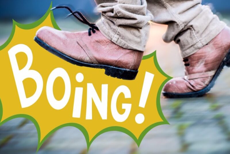 An image of a pair of feet stepping on a graphic with a yellow background and white text saying 'boing!'