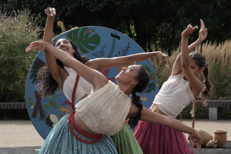 An image of a group of three South Asian female dancers.